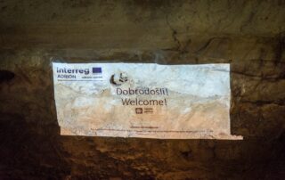 Welcome projection on cave wall at Lipa Cave, Interreg ADRION Adriaticaves project, Montenegro